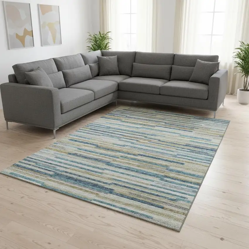 Blue Ivory And Gold Abstract Washable Area Rug With UV Protection Photo 1