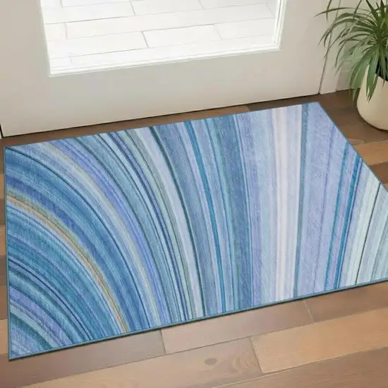 Blue Ivory And Gold Abstract Washable Area Rug With UV Protection Photo 1