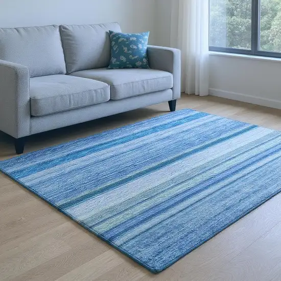 Blue Ivory And Gold Abstract Washable Area Rug With UV Protection Photo 2