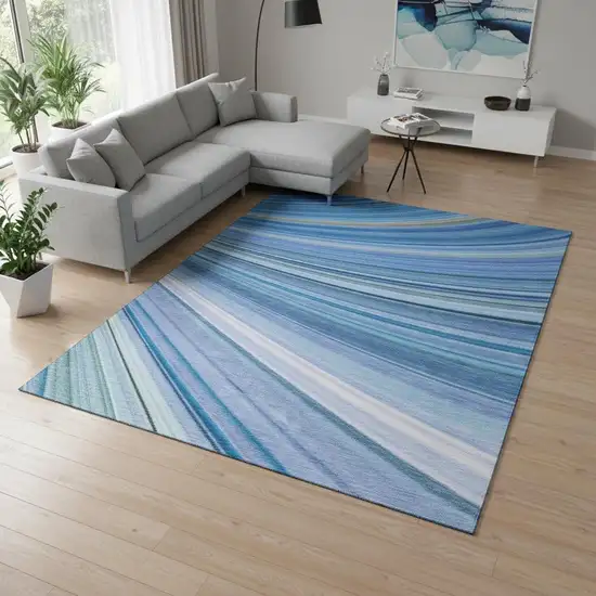 Blue Ivory And Gold Abstract Washable Area Rug With UV Protection Photo 2