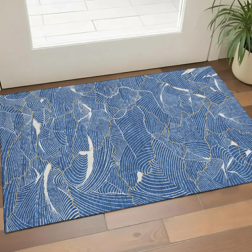 Blue Ivory And Gold Abstract Washable Area Rug With UV Protection Photo 1
