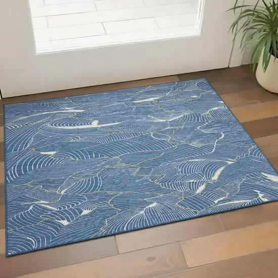 Blue Ivory And Gold Abstract Washable Area Rug With UV Protection Photo 2