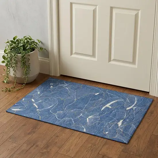 Blue Ivory And Gold Abstract Washable Area Rug With UV Protection Photo 1