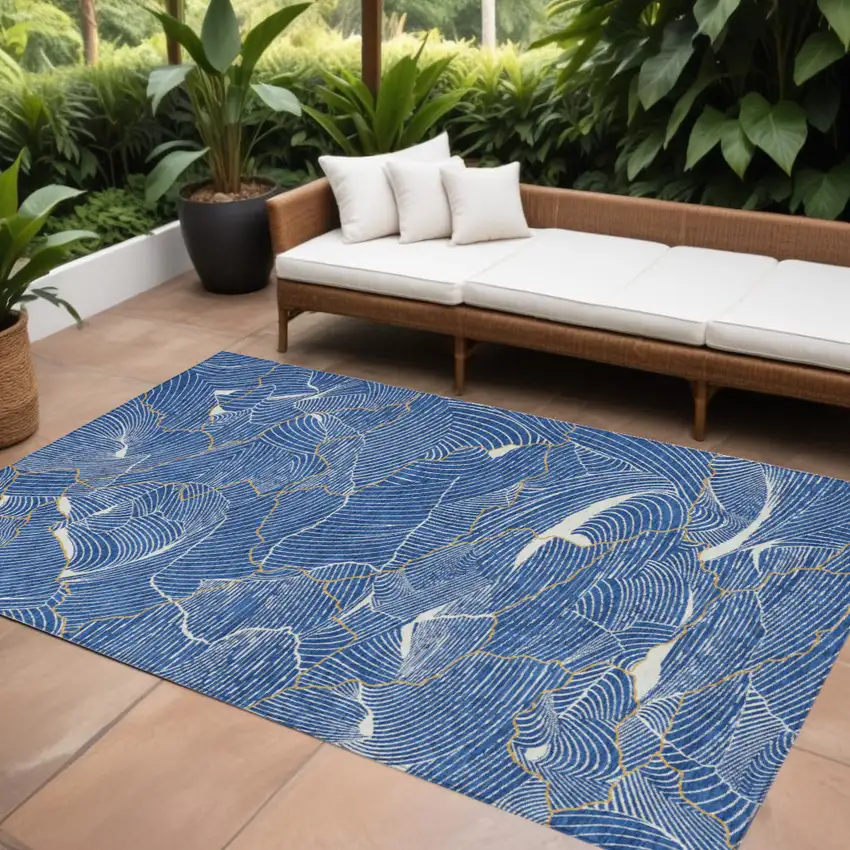 Blue Ivory And Gold Abstract Washable Indoor Outdoor Area Rug Photo 1