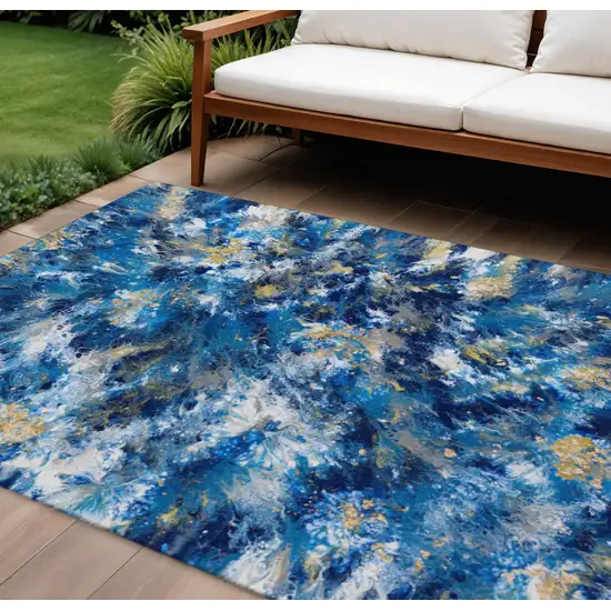 Blue Ivory And Gold Abstract Washable Indoor Outdoor Area Rug Photo 1