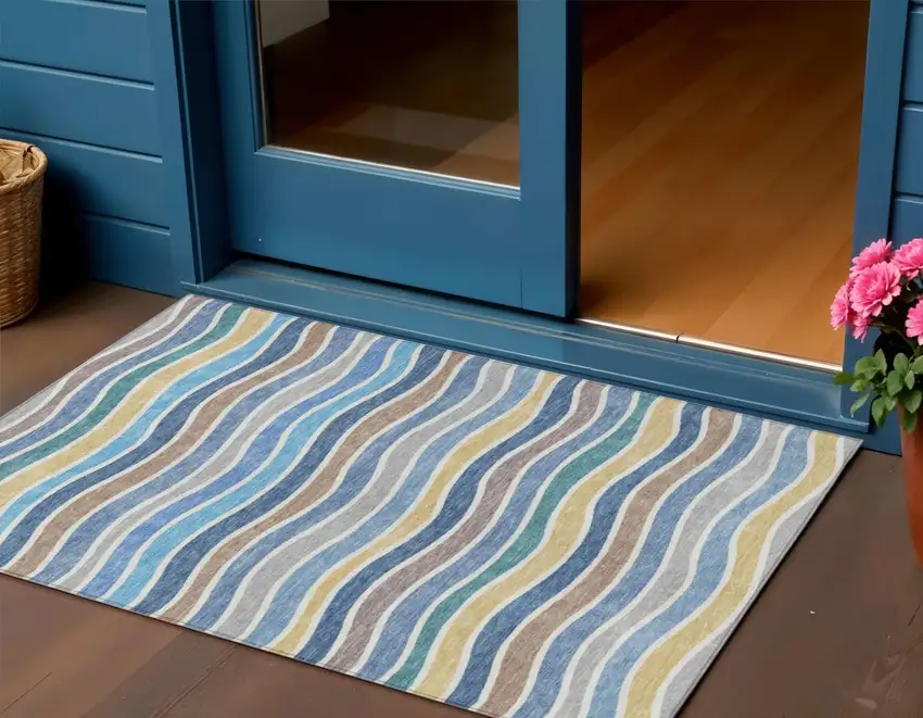 Blue Ivory And Gold Striped Washable Indoor Outdoor Area Rug Photo 1