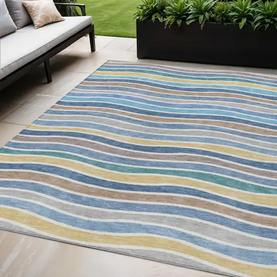 Blue Ivory And Gold Striped Washable Indoor Outdoor Area Rug Photo 1
