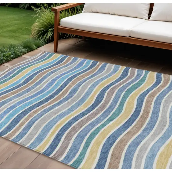 Blue Ivory And Gold Striped Washable Indoor Outdoor Area Rug Photo 1