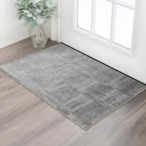 Photo of Blue Ivory And Gray Abstract Hand Woven Distressed Area Rug