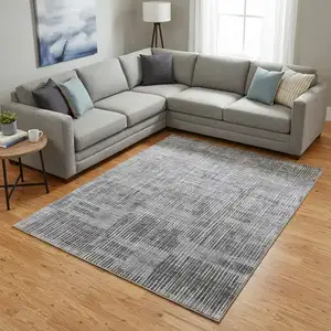 Photo of Blue Ivory And Gray Abstract Hand Woven Distressed Area Rug