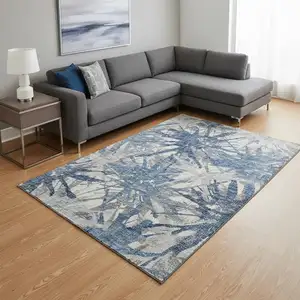 Photo of Blue Ivory And Gray Abstract Washable Area Rug With UV Protection