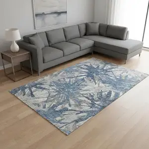 Photo of Blue Ivory And Gray Abstract Washable Area Rug With UV Protection