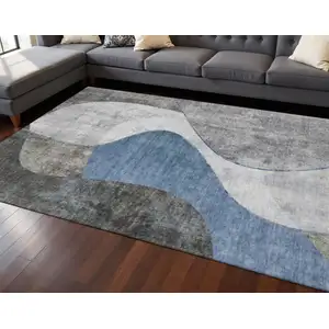 Photo of Blue Ivory And Gray Abstract Washable Area Rug With UV Protection