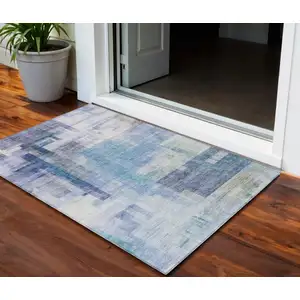 Photo of Blue Ivory And Gray Abstract Washable Indoor Outdoor Area Rug