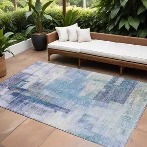 Photo of Blue Ivory And Gray Abstract Washable Indoor Outdoor Area Rug