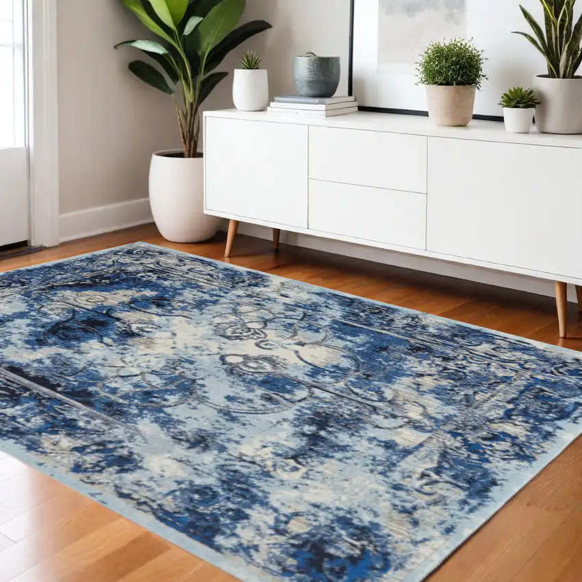 Blue Ivory And Gray Floral Distressed Stain Resistant Area Rug Photo 1