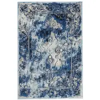Photo of Blue Ivory And Gray Floral Distressed Stain Resistant Area Rug