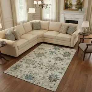 Photo of Blue Ivory And Gray Floral Medallion Washable Area Rug With UV Protection