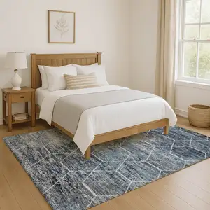 Photo of Blue Ivory And Gray Geometric Washable Area Rug With UV Protection