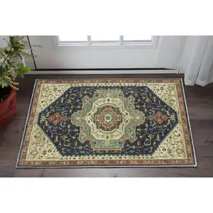 Photo of Blue Ivory And Gray Oriental Area Rug With Fringe