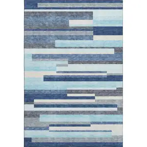 Photo of Blue Ivory And Gray Striped Washable Area Rug With UV Protection