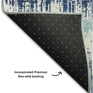 Photo of Blue Ivory And Gray Striped Washable Area Rug With UV Protection