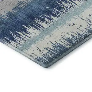 Photo of Blue Ivory And Gray Striped Washable Area Rug With UV Protection