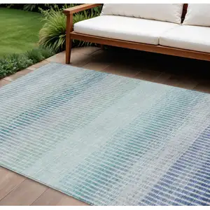 Photo of Blue Ivory And Gray Striped Washable Indoor Outdoor Area Rug