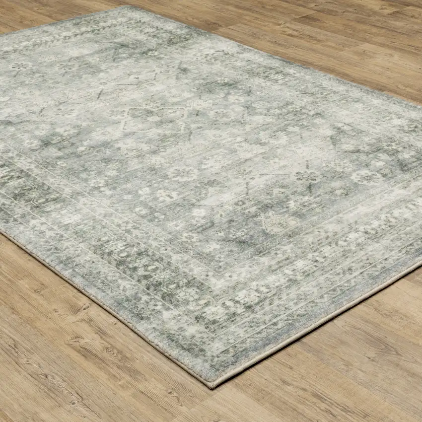 Blue Ivory And Grey Oriental Power Loom Stain Resistant Area Rug Photo 6