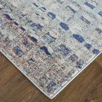 Photo of Blue Ivory And Orange Abstract Power Loom Stain Resistant Area Rug