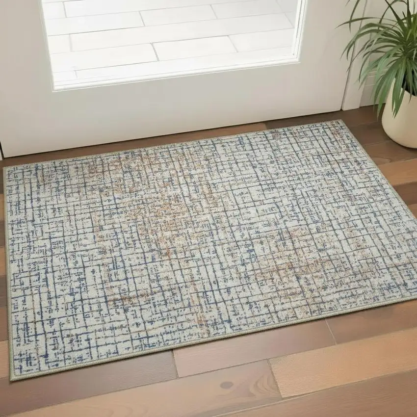 Blue Ivory And Orange Abstract Washable Area Rug Photo 1