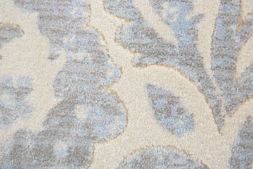 Blue Ivory And Tan Floral Distressed Stain Resistant Area Rug Photo 8
