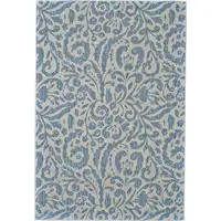 Photo of Blue Ivory And Tan Floral Distressed Stain Resistant Area Rug