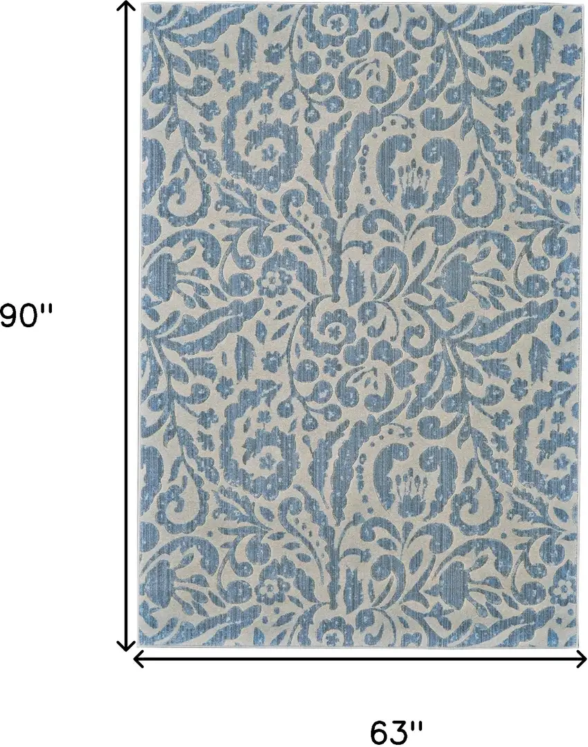 Blue Ivory And Tan Floral Distressed Stain Resistant Area Rug Photo 10