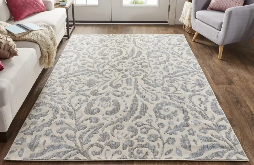 Blue Ivory And Tan Floral Distressed Stain Resistant Area Rug Photo 6