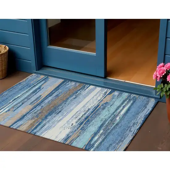 Blue Ivory And Taupe Striped Washable Indoor Outdoor Area Rug Photo 1