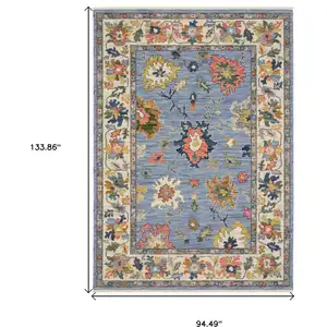 Photo of Blue Ivory And Yellow Oriental Area Rug With Fringe