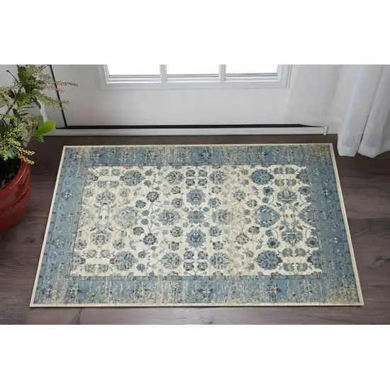 Ivory And Sky Blue Oriental Area Rug Photo 1