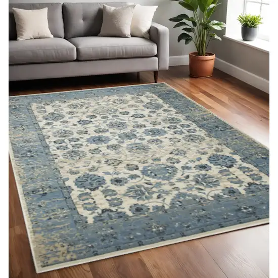 Ivory And Sky Blue Oriental Area Rug Photo 1