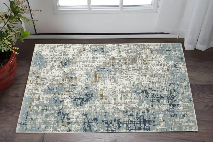 Blue Ivory Grey Brown Beige And Light Blue Abstract Power Loom Stain Resistant Area Rug Photo 1