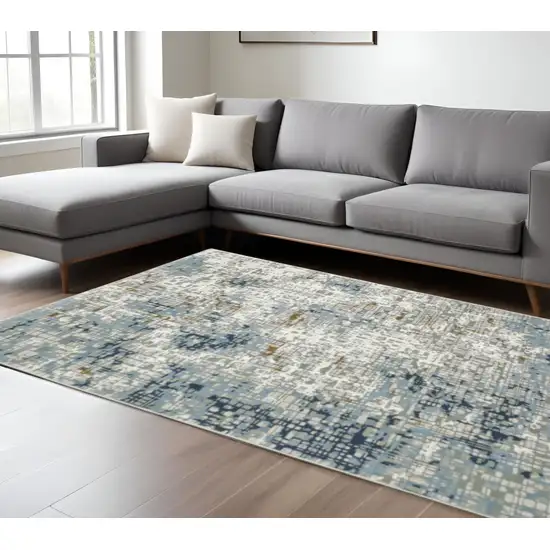 6' X 9' Blue Ivory Grey Brown Beige And Light Blue Abstract Power Loom Stain Resistant Area Rug Photo 1