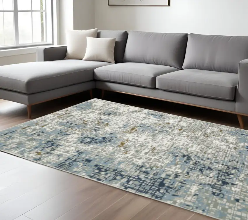 6' X 9' Blue Ivory Grey Brown Beige And Light Blue Abstract Power Loom Stain Resistant Area Rug Photo 1