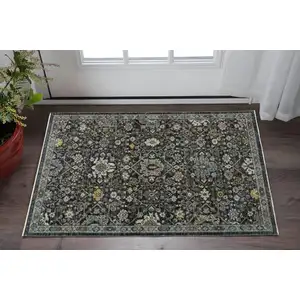 Photo of Blue Ivory Grey Gold Green And Brown Oriental Power Loom Stain Resistant Area Rug With Fringe