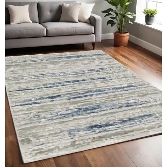 Blue Ivory Grey Light Blue And Brown Abstract Power Loom Stain Resistant Area Rug Photo 1