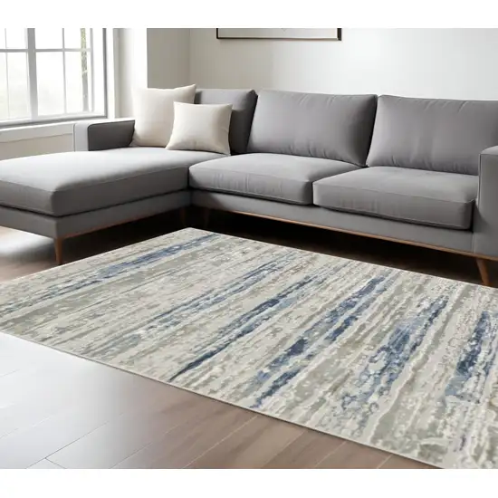 Blue Ivory Grey Light Blue And Brown Abstract Power Loom Stain Resistant Area Rug Photo 1