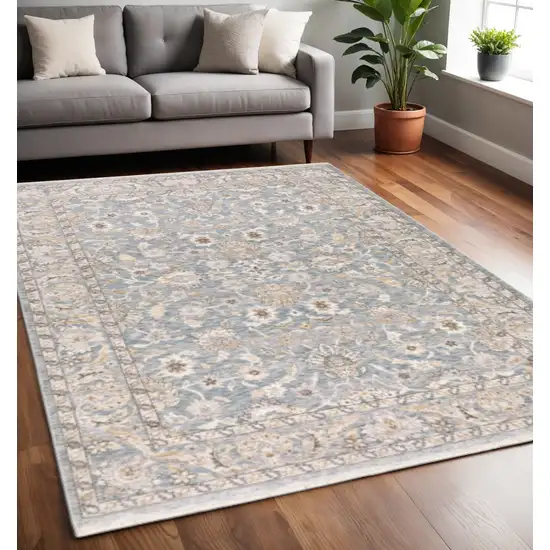 Blue And Ivory Oriental Distressed Area Rug Photo 1