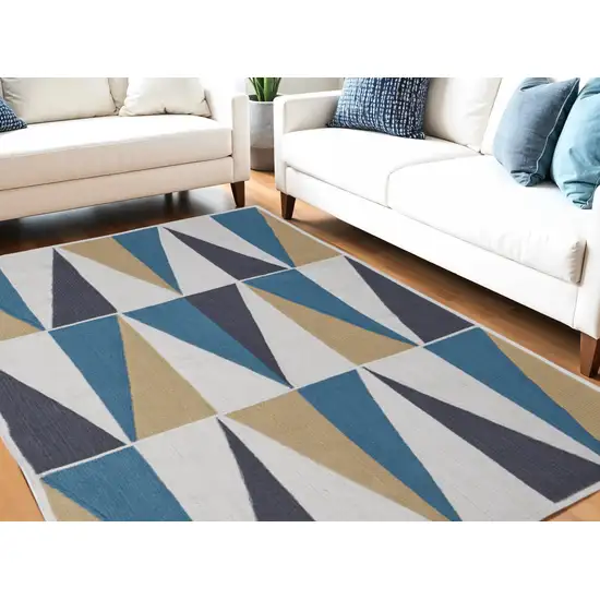 Blue Ivory and Gold Geometric Power Loom Area Rug Photo 1