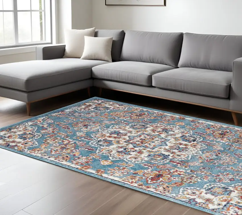 Ivory Blue and Orange Medallion Power Loom Area Rug Photo 1
