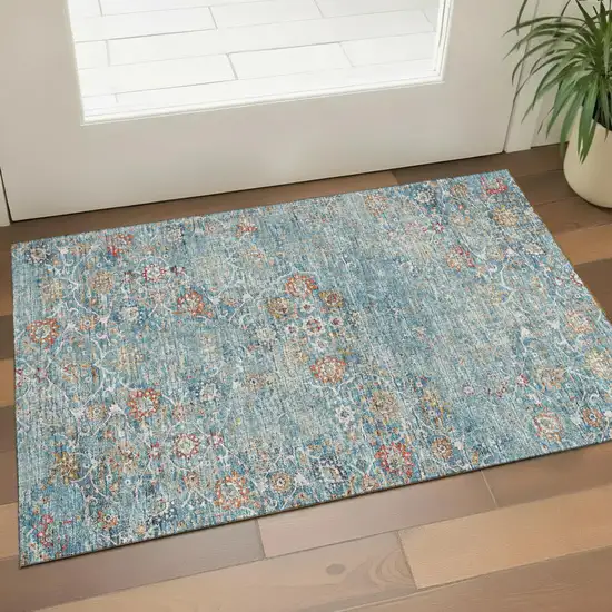 Blue Orange And Gold Floral Medallion Washable Area Rug With UV Protection Photo 1