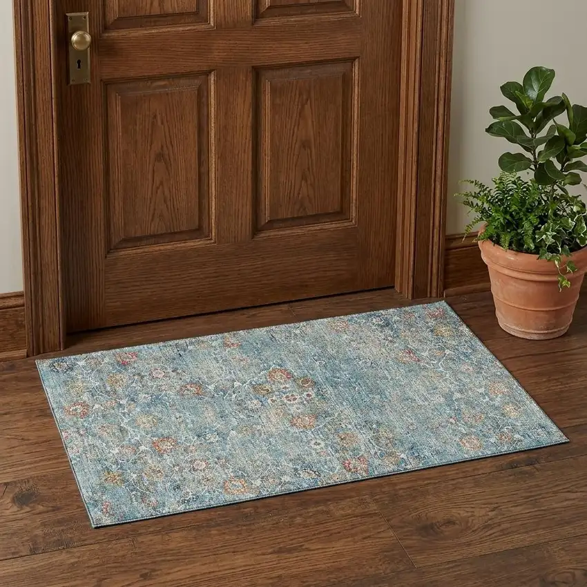 Blue Orange And Gold Floral Medallion Distressed Washable Area Rug With UV Protection Photo 1